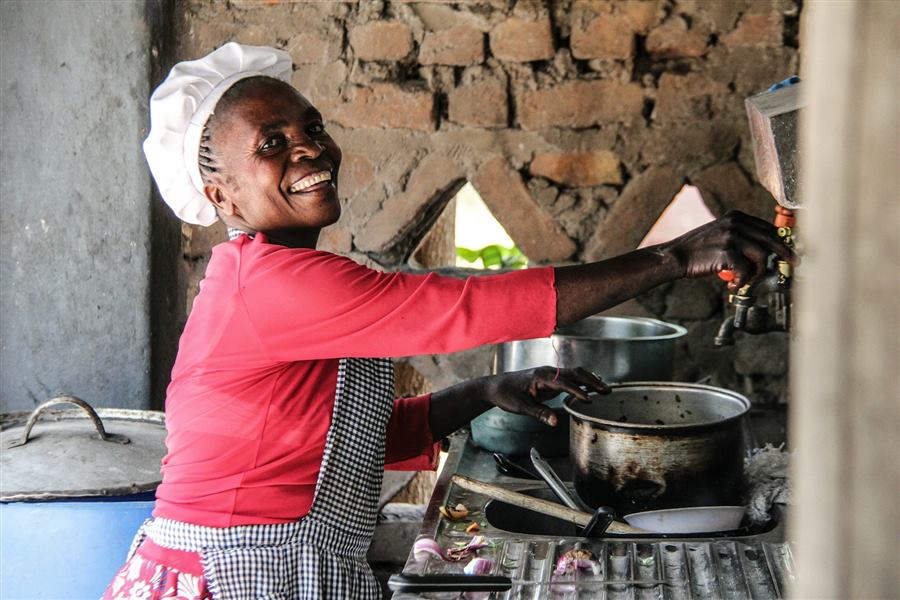 A woman cooking in a home kitchen